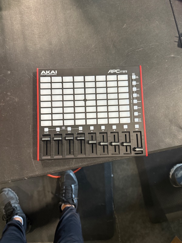 Photo 1 of AKAI Professional APC Mini MK2 - USB MIDI Pad Controller for Clip Launching with Ableton Live Lite, 64 RGB Pads, Drum and Note Mode and MIDI Mixer