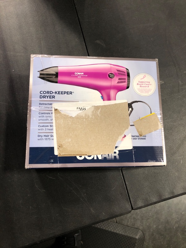 Photo 2 of Conair Hair Dryer with Retractable Cord, 1875W Cord-Keeper Blow Dryer Pink