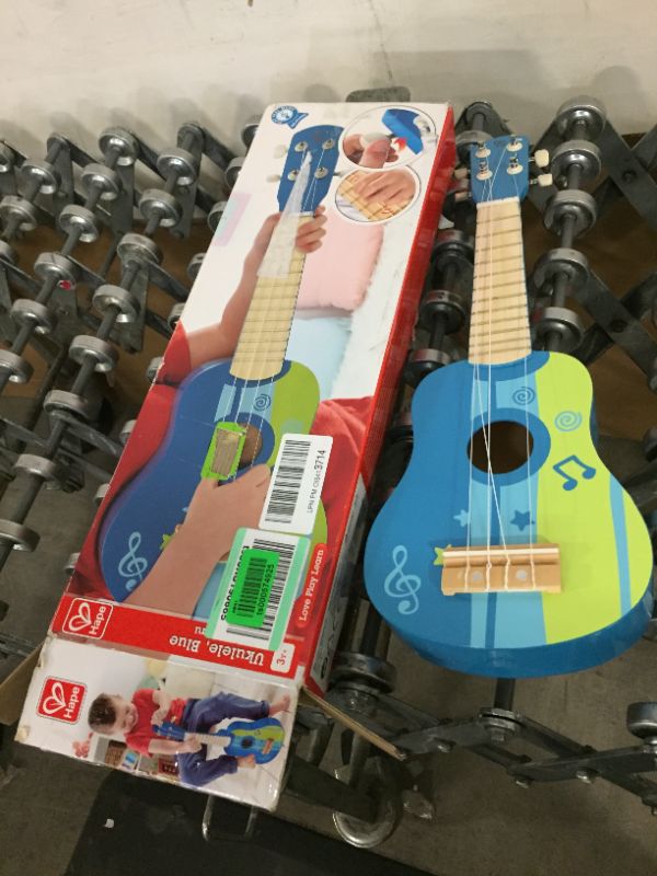 Photo 2 of Hape Kid's Wooden Toy Ukulele in Blue, L: 21.9, W: 8.1, H: 3 inch