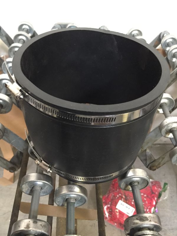 Photo 2 of Fernco 1056-66 6-in. Flexible PVC Pipe Coupling for Cast Iron / Plastic / Steel Plumbing Connections in Black