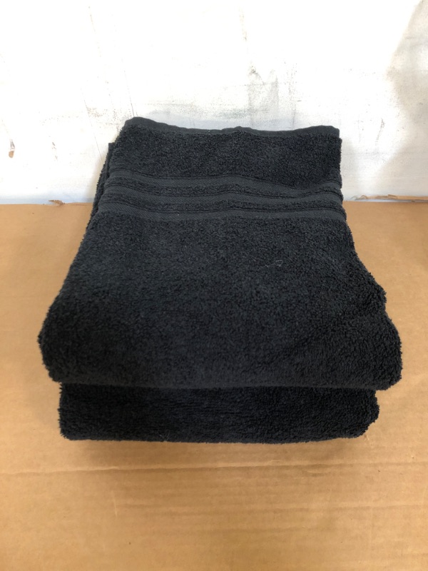 Photo 1 of 2 black bath towels