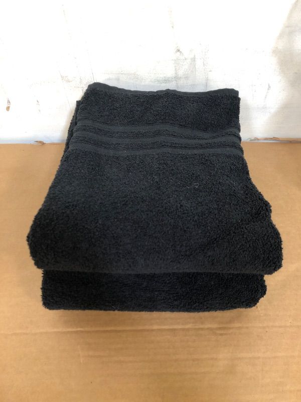 Photo 1 of 2 black bath towels