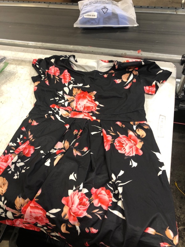 Photo 1 of BLACK FLORAL TOP ( MED) 