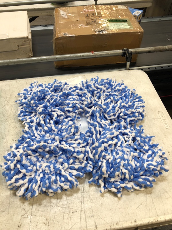 Photo 1 of 4 PC WHITE AND BLUE MOP REPLACEMENT HEADS