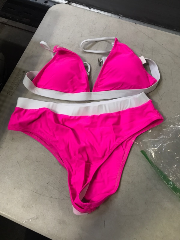 Photo 1 of 2 piece pink and white bathing suit size large 