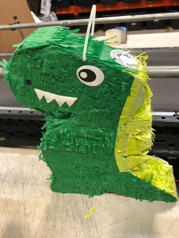 Photo 1 of dinosaur pinata for jurassic size fun at parties and celebrations