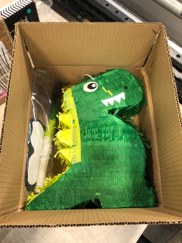 Photo 1 of dinosaur pinata for jurassic size fun at parties and celebrations