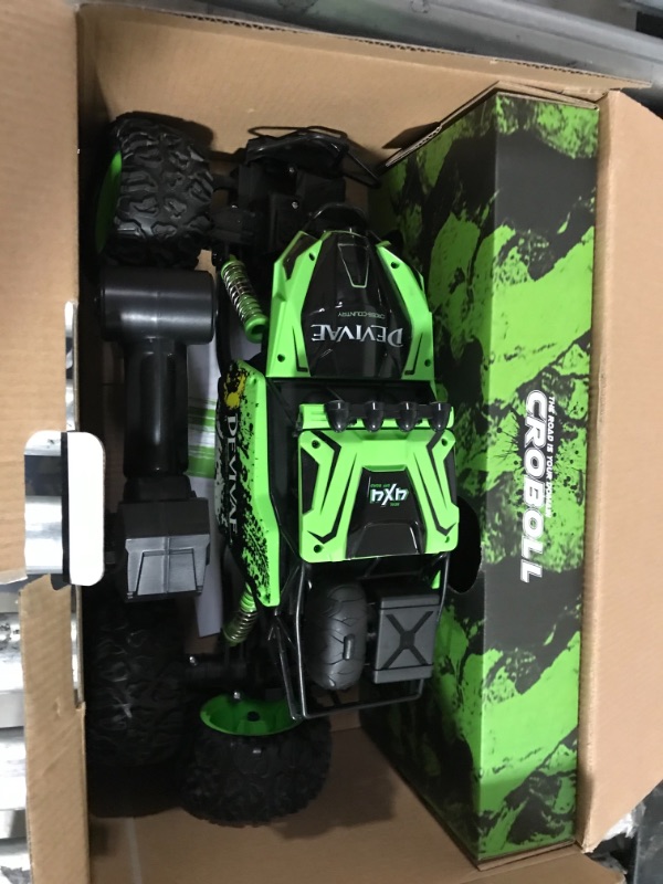 Photo 2 of CROBOLL 1:12 Large Remote Control Car for Boys with Upgraded Lifting Function, 4WD 20km/h RC Car Toys for Kids 4X4 Off-Road RC Rock Crawler, 2.4GHz All Terrain RC Monster Truck for 60Mins Play(Green)