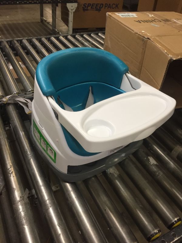 Photo 2 of Ingenuity Baby Base 2-in-1 Booster Feeding and Floor Seat with Self-Storing Tray - Peacock Blue
