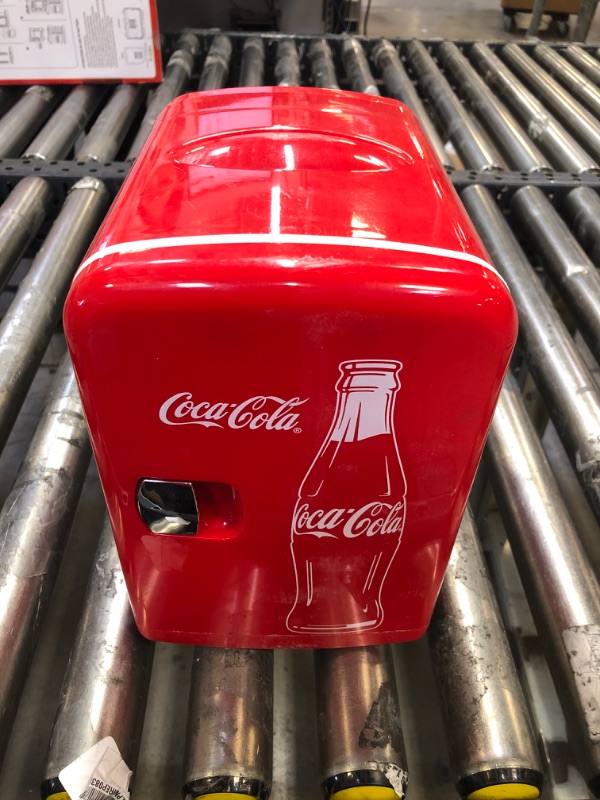 Photo 2 of Coca-Cola 6 Can Mini Fridge 4L Mini Electric Cooler 12V Car Cooler
