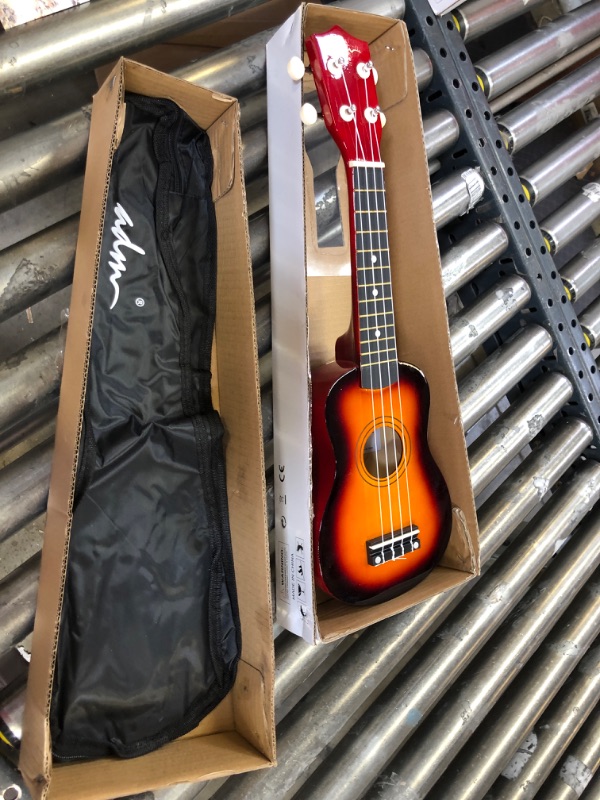 Photo 3 of ADM Soprano Ukulele for Beginners 21 Inch Hawaiian Wood Ukelele Kit for Kids Adult Student Starter Professional Ukalelee Pack Bundle with Free Lessons Gig Bag Strap Nylon String Tuner Pick, Sunset