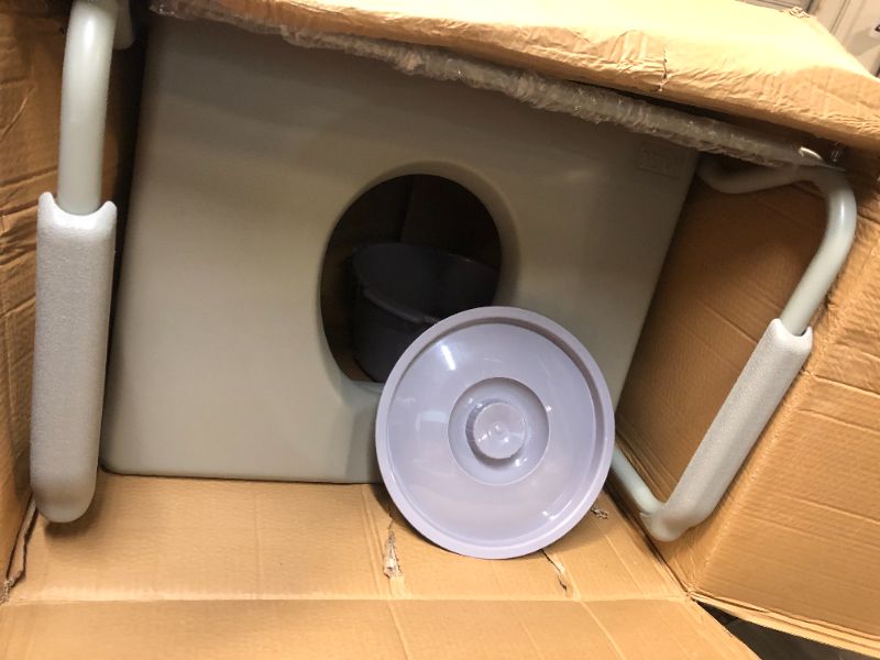 Photo 1 of DMI Bedside Commode, Portable Toilet, Commode Chair, Raised Toilet Seat with Handles, Holds up to 500 Pounds with Included 7 qt Commode Bucket, Adjustable from 19-23 Inches, Extra Wide Commode