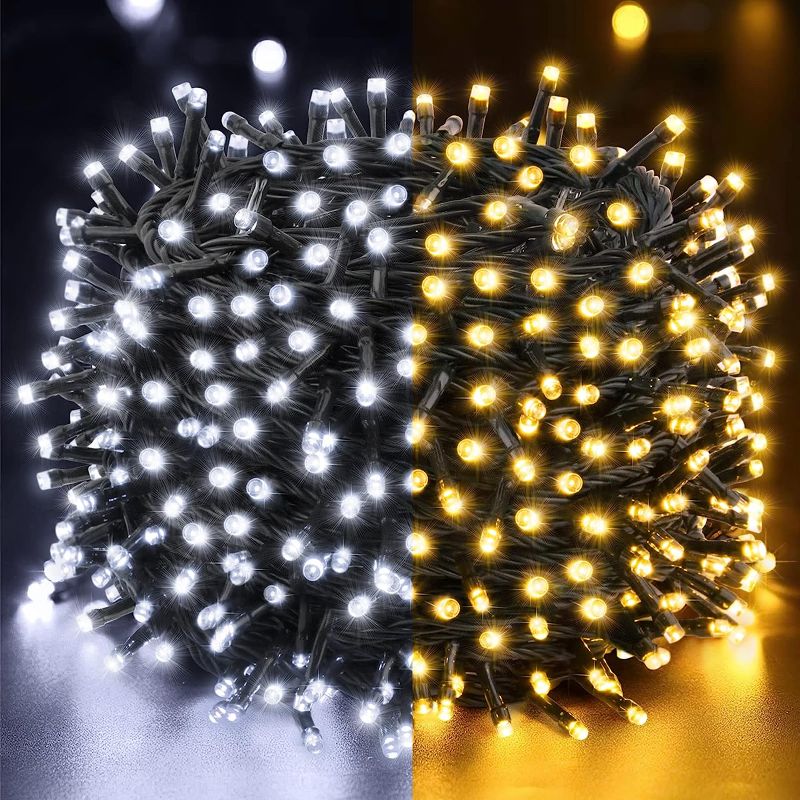 Photo 1 of Techip 300LED Christmas Lights 11Modes Connectable Waterproof Plug in Christmas String Lights White&Warm White Decorative Lights for Xmas Party Green Wire Fairy String Lights 108FT for Outdoor Indoor
