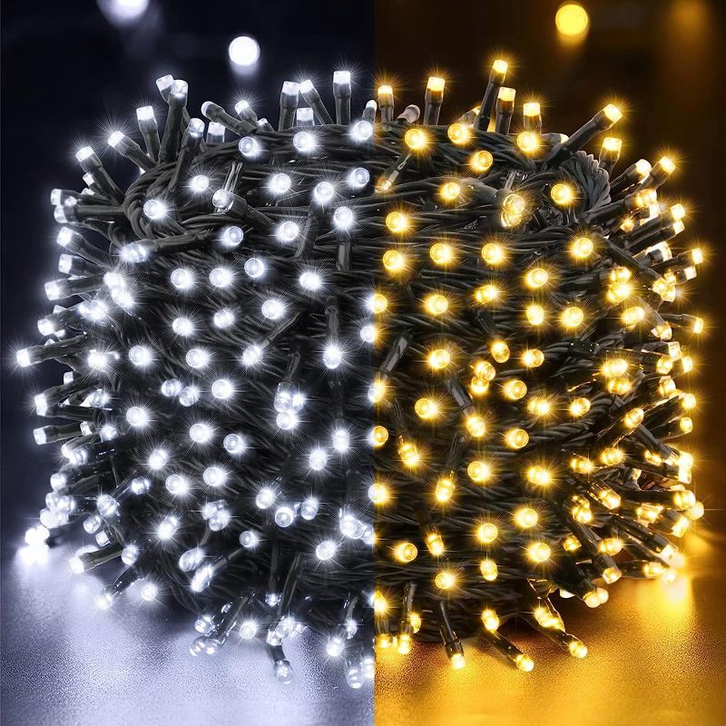 Photo 1 of Techip 300LED Christmas Lights 11Modes Connectable Waterproof Plug in Christmas String Lights White&Warm White Decorative Lights for Xmas Party Green Wire Fairy String Lights 108FT for Outdoor Indoor
