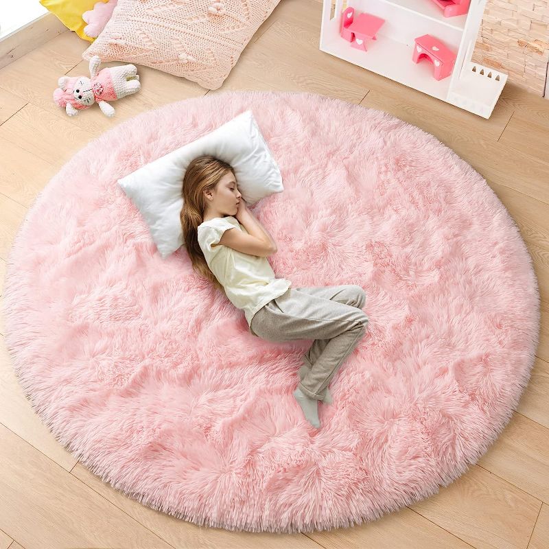 Photo 1 of junovo Pink Round Rug 5x5 Feet Fluffy Soft Area Rugs for Kids Girls Room Princess Castle Plush Shaggy Carpet Cute Circle Nursery Rug for Kids Girls Bedroom Baby Room Home Decor Circular Carpet
