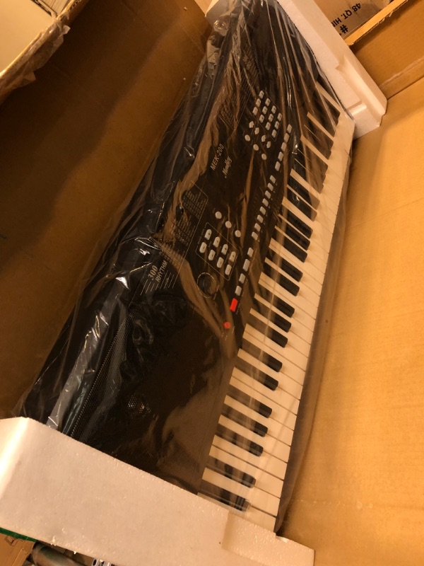 Photo 2 of Moukey Keyboard Piano, 61 Key Piano Keyboard, Full-Size Electric Piano, Superior Sound, Powerful Functions, Durable keys, Electric Keyboard with Music Stand and Power Adapter, Portable Music Keyboard MEK-61 Key Keyboard