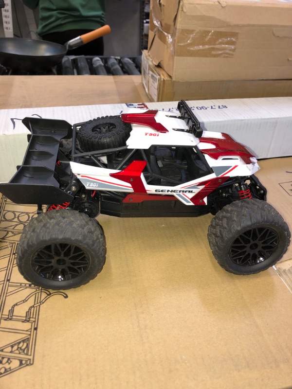 Photo 3 of NATURE'S SOURCE 1:12 Remote Control Car - Variable Speed 33 KM/H RC Cars, RC Monster Trucks Offroad RC Truck Toys with LED Headlight and Rechargeable Battery Gift for Adults Boys 8 9 10 12 Kids