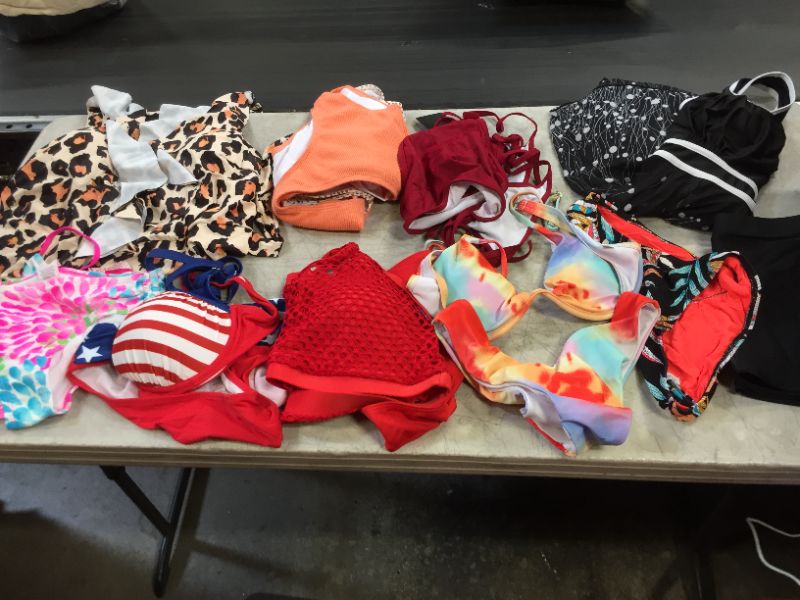 Photo 1 of BAG LOT OF WOMEN'S BATHING SUITS ---DIFFERNT STYLES AND SIZES --- SOLD AS IS---  