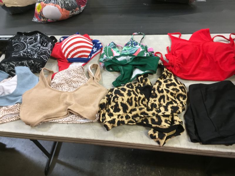 Photo 1 of BAG LOT OF WOMEN'S BATHING SUITS ---DIFFERNT STYLES AND SIEZ --SOLD IS AS-- 
