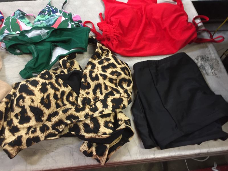 Photo 2 of BAG LOT OF WOMEN'S BATHING SUITS ---DIFFERNT STYLES AND SIEZ --SOLD IS AS-- 
