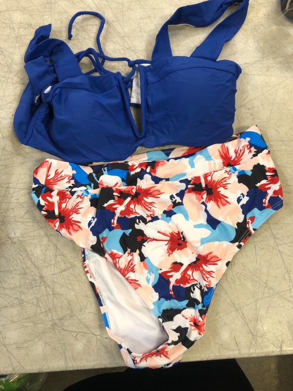 Photo 1 of 2 PIECE BATHING SUIT -BLUE TOP/FLORAL BOTTOM 
SIZE- LARGE