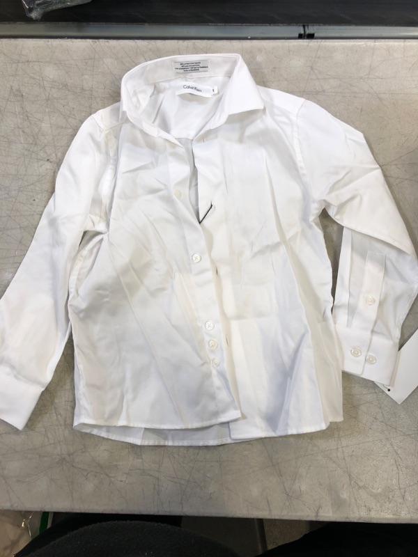 Photo 2 of Calvin Klein Boys' Long Sleeve Sateen Dress Shirt, Style with Buttoned Cuffs & Shirttail Hem 5 White