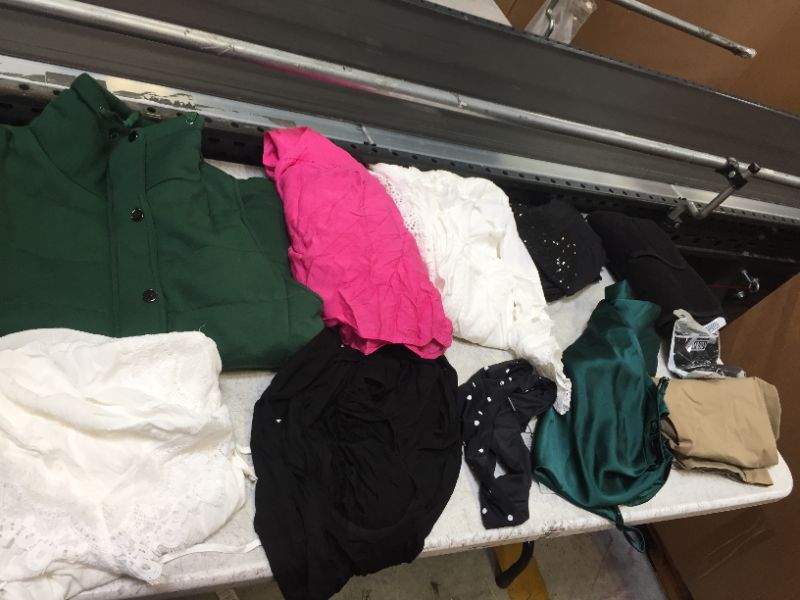 Photo 1 of BAG LOT OF WOMEN AND MEN'S CLOTHING - DIFFERENT STYLES AND SIZES -- -- SOLD AS IS -- 