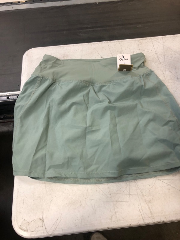 Photo 1 of LIGHT GREEN ATHLETIC SKIRT WITH BULT IN SHORTS MEDIUM 