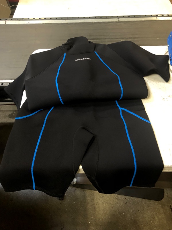 Photo 1 of ADULT WET SUIT BLACK/BLUE LARGE