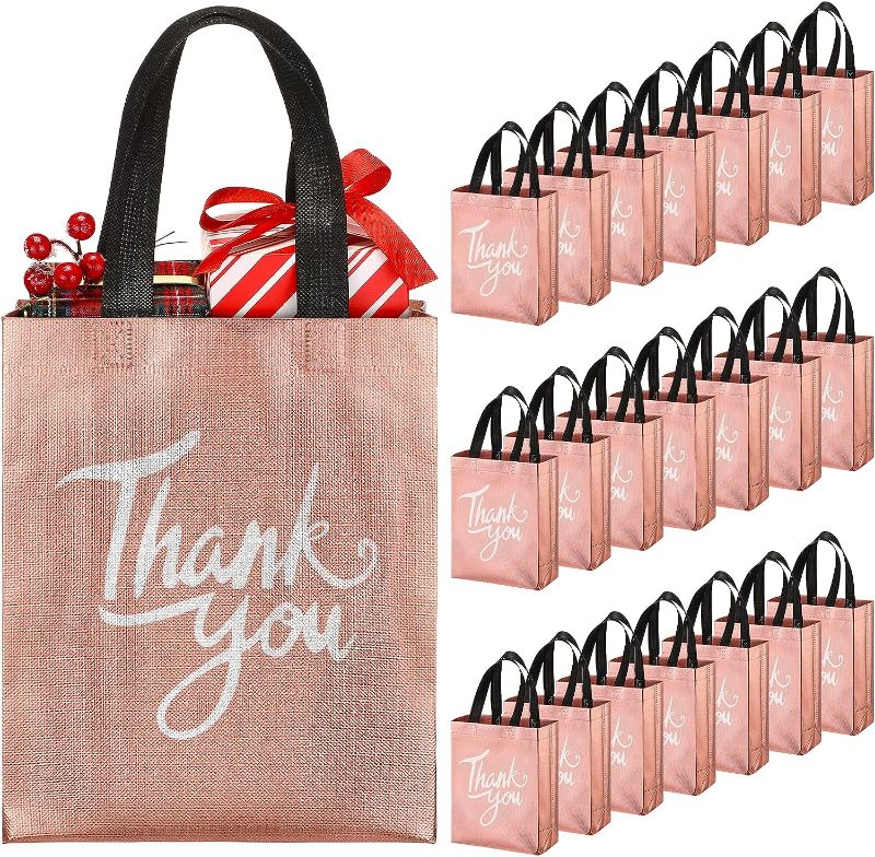 Photo 1 of 24 Pcs Rose Gold Gift Bags Bridesmaids Gift Bags Reusable Bachelorette Non Woven Thank You Gift 8" x 4" x 10" Party Favor Goodie Bags with Handles for Wedding Birthday Graduation Party Christmas
`