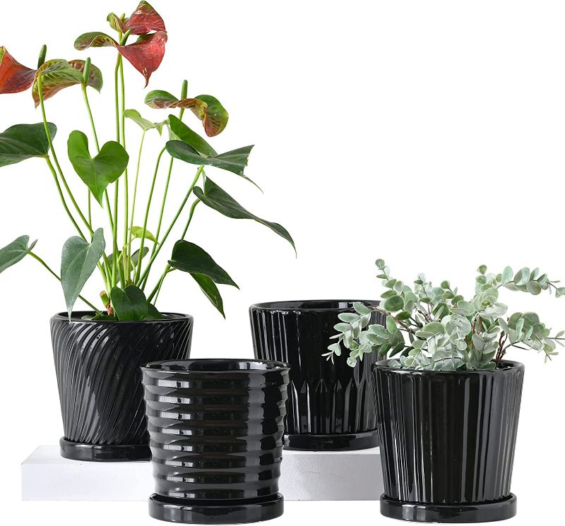Photo 1 of Ton Sin Flower Pots,Black 6 Inch Plant Pots for Plants,Ceramic Planters with Drainage Holes,Indoor Flower Pot with Saucer,Outdoor Garden Pots (Black, 4 Pack)
