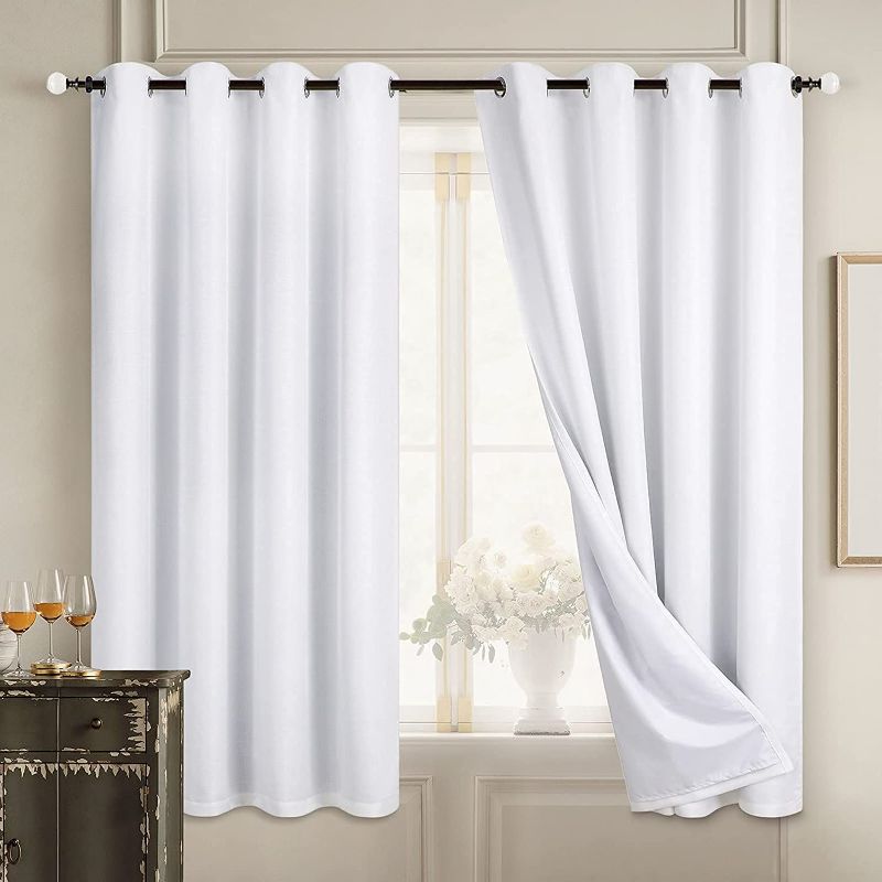 Photo 1 of Diraysid 100% Blackout Curtains White Linen Curtains for Bedroom Grommet Thermal Insulated Room Darkening Drapes (2 Panels, W52 x L72 Inch)
