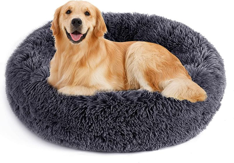 Photo 1 of NOYAL Calming Dog Bed Donut Anti Anxiety Fluffy Dog Bed for Small Medium Dog and Cat
