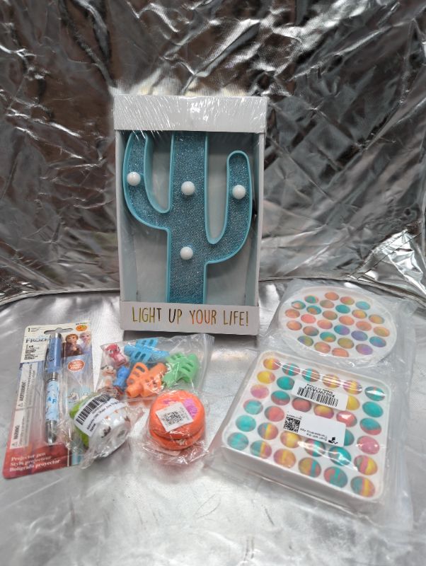 Photo 1 of Toy/Kid Bundle - Cactus Marquee Light, Yoyo, Frozen Pen, Pencil Grippers, Pencil Sharpener, Pop-It Sensory Toys