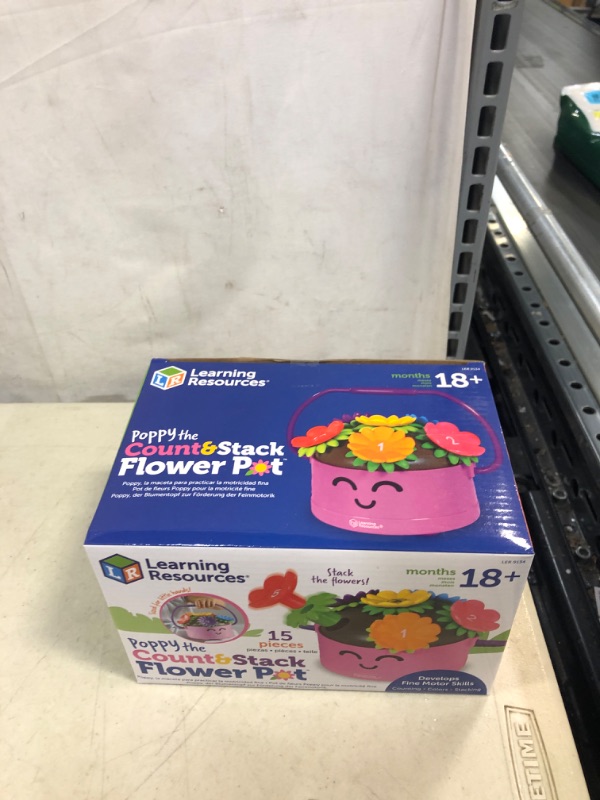 Photo 1 of Learning Resources Poppy the Count & Stack Flower Pot - 15 Pieces Toddler Learning Toys for Boys and Girls Ages 18+ Months Sorting Toys for Toddlers
