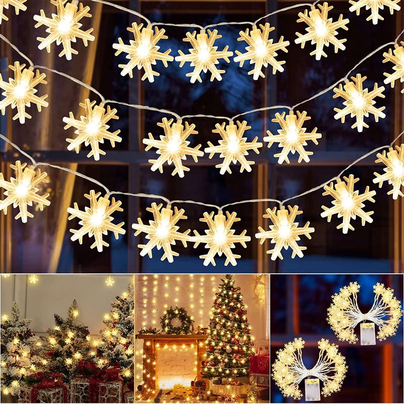 Photo 1 of [ 2 Pack + Timer ] Total 100 LED 39.4Ft Christmas Snowflake String Lights Decoration, Xmas Lights Battery Operated Christmas Fairy Lights Indoor Outdoor Home Window Bedroom Tree Garden(Warm White)
