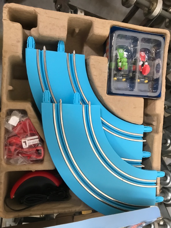 Photo 1 of Carrera First Mario Kart - Slot Car Race Track With Spinners - Includes 2 Cars: Mario and Yoshi - Battery-Powered Beginner Racing Set for Kids Ages 3 Years and Up Mario Kart w/ Spinners