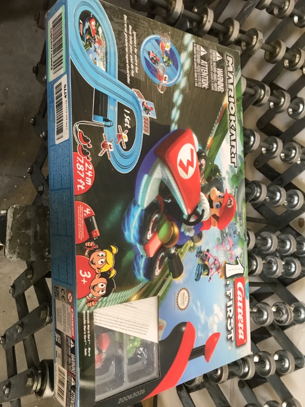 Photo 1 of Carrera First Mario Kart - Slot Car Race Track With Spinners - Includes 2 Cars: Mario and Yoshi - Battery-Powered Beginner Racing Set for Kids Ages 3 Years and Up Mario Kart w/ Spinners