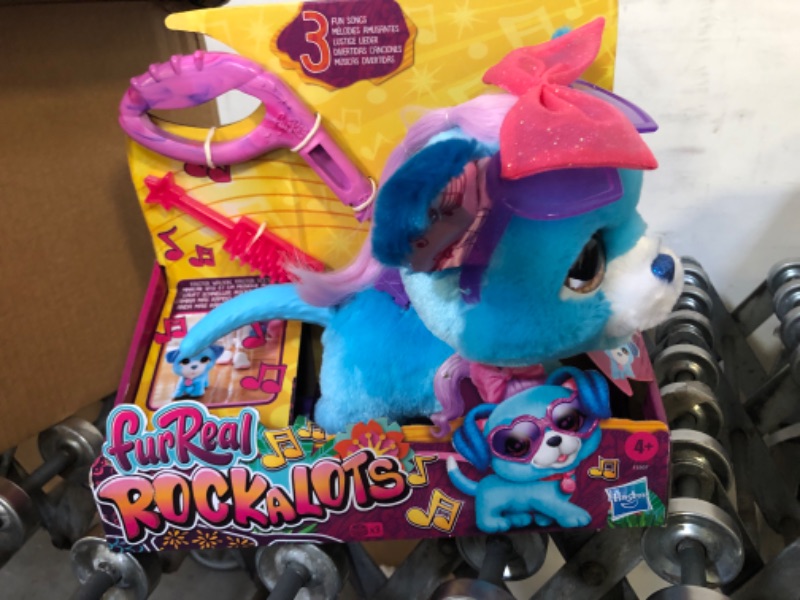 Photo 3 of FurReal Rockalots Musical Interactive Walking Puppy Toy: 3 Fun Songs, Sound Effects, Bobblehead Motion, 2 Themed Accessories and Leash, Ages 4 and Up