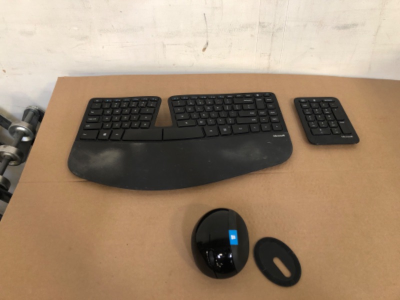 Photo 2 of Microsoft Ergonomic Keyboard - Black. Wired, Comfortable, Ergonomic Keyboard with Cushioned Wrist and Palm Support. Split Keyboard. Dedicated Office Key.