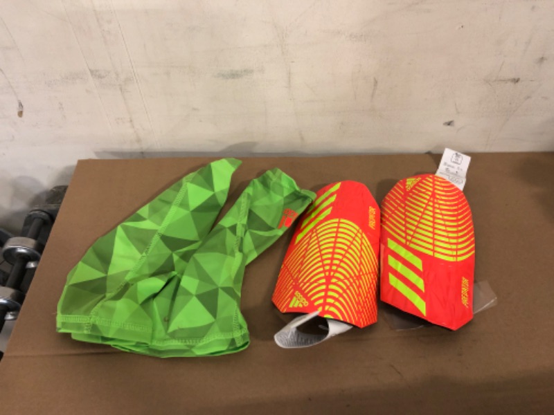 Photo 2 of adidas Unisex Soft Ground Competition Shinguards Large Solar Red/Team Solar Green/Team Solar Green