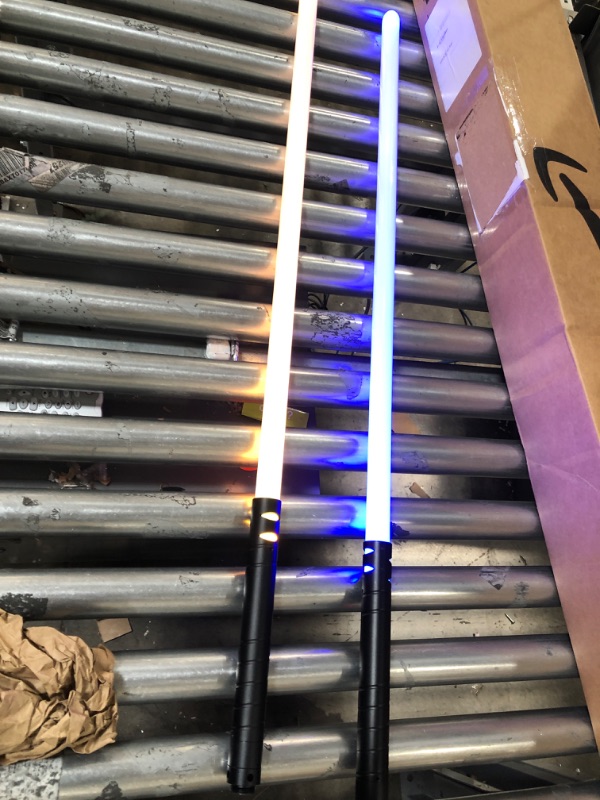 Photo 1 of 2-in-1 Light Up Saber Connectable LED Laser Sword with FX Sound