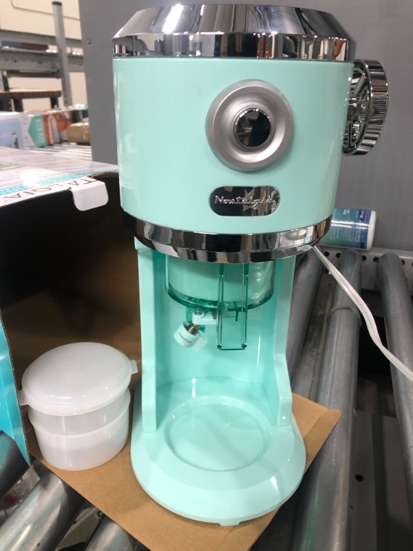 Photo 2 of Nostalgia Retro Electric Table-Top Snow Cone Maker, Vintage Shaved Ice Machine Includes 2 Molds, Aqua
