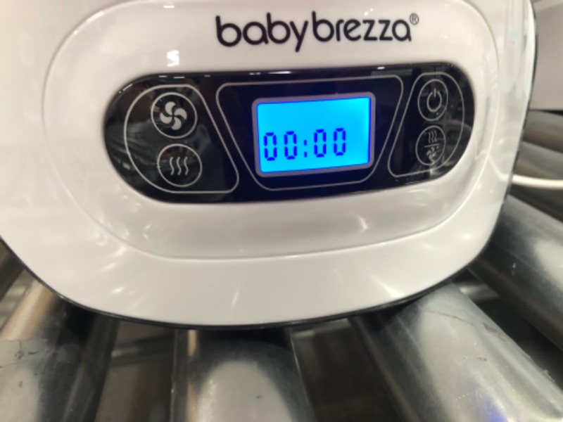 Photo 3 of Baby Brezza Baby Bottle Sterilizer and Dryer Machine – Electric Steam Sterilization - Universal Fit - Pacifiers, Glass, Plastic, and Newborn Feeding Bottles