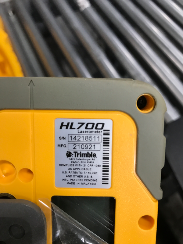 Photo 1 of Spectra Precision LL500 Self-Leveling Laser Level with HL700 Receiver, C70 Rod Clamp, Alkaline Batteries, Carry Case, Yellow