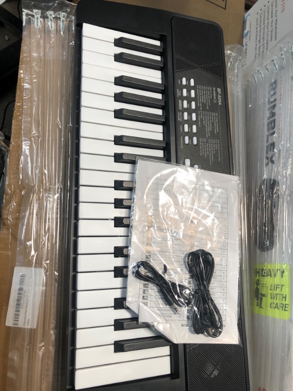 Photo 2 of Beginners Piano Keyboard 37 Keys Portable Electronic Keyboard Piano Built-in Rechargeable Battery Kids Piano with Headphone Jack Learning Musical Instruments Gifts for 3 4 5 6 7 Boys Girls