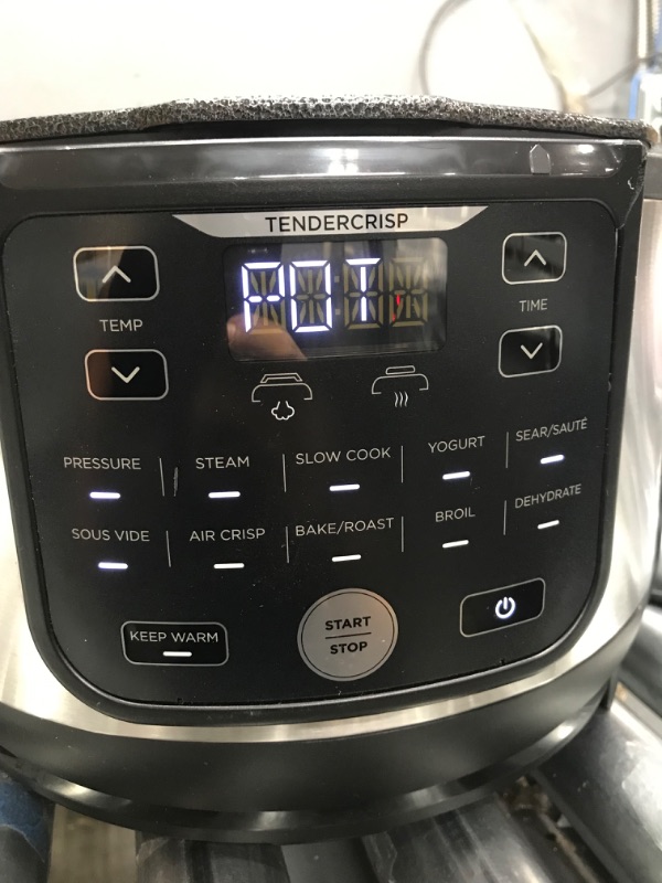 Photo 4 of **MINOR COSMETIC DAMGE, TESTED**Ninja Foodi 9-in-1 Pressure Cooker and Air Fryer with Nesting Broil Rack, 5 Quart, Stainless Steel
