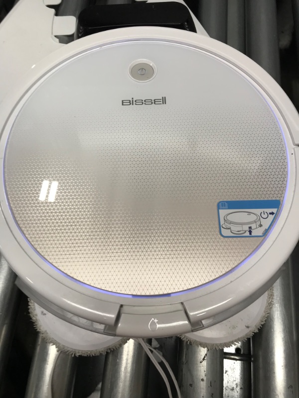 Photo 4 of Bissell SpinWave Pet Robot, 2-in-1 Wet Mop and Dry Robot Vacuum, WiFi Connected with Structured Navigation, 3347
*****HAS POWER DOESNT MOVE, NEEDS REPAIR******
