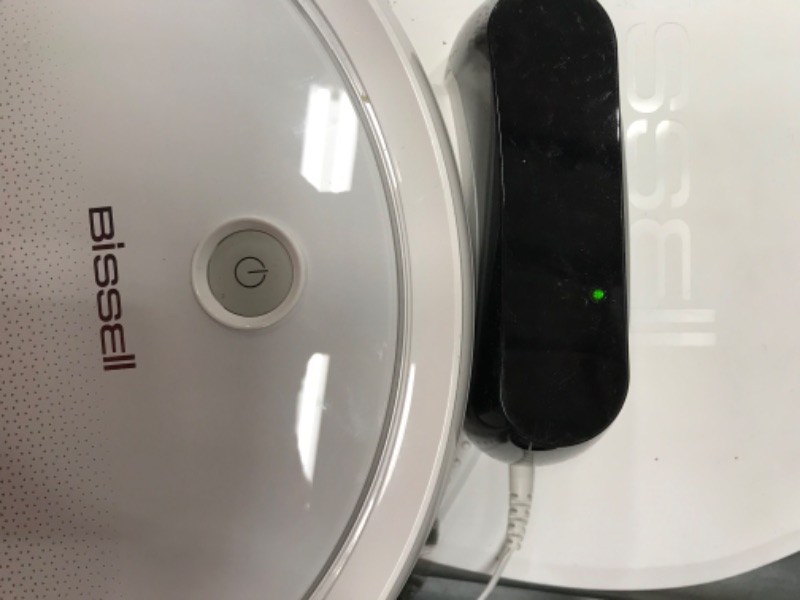 Photo 3 of Bissell SpinWave Pet Robot, 2-in-1 Wet Mop and Dry Robot Vacuum, WiFi Connected with Structured Navigation, 3347
*****HAS POWER DOESNT MOVE, NEEDS REPAIR******
