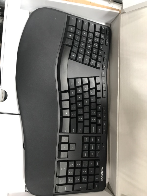 Photo 2 of Microsoft Ergonomic Keyboard - Black. Wired, Comfortable, Ergonomic Keyboard with Cushioned Wrist and Palm Support. Split Keyboard. Dedicated Office Key.